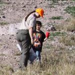 Boy scout troop working on the dike