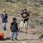 The cub scouts working hard