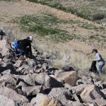 Lots of little trash to pick out of those big rocks