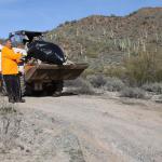 Loading up road trash and one big tire